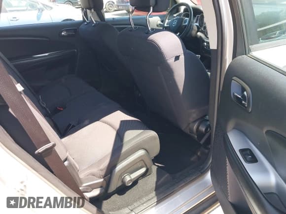 ✅ 2013 Dodge Journey SE • VIN: 3C4PDCAB3DT552847 • Lot: 42409901. Listed on IAAI with 97,482 mi. Free auction sales archive from the USA and detailed vehicle history report at DreamBid. Image 8.