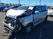✅ 2010 Scion xB • VIN: JTLZE4FE4A1118474 • Lot: 43732313. Listed on IAAI with 177,572 mi. Free auction sales archive from the USA and detailed vehicle history report at DreamBid. Image 2.