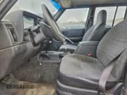 ✅ 2001 Jeep Cherokee Sport • VIN: 1J4FF48S01L597568 • Lot: 95472095. Listed on Copart with 299,978 mi. Free auction sales archive from the USA and detailed vehicle history report at DreamBid. Image 7.