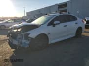 ✅ 2020 Subaru WRX • VIN: JF1VA1A65L9808118 • Lot: 82530225. Listed on Copart with 74,896 mi. Free auction sales archive from the USA and detailed vehicle history report at DreamBid. Image 1.