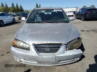 2005 Hyundai Elantra GLS z VIN KMHDN46D75U096046, wystawiony jako Copart lot #68332904 z przebiegiem 175 947 mil mil oraz Szkoda całkowita • Salvage title. Historia ofert i sprzedaży dostępna na DreamBid. Obrazek 5.