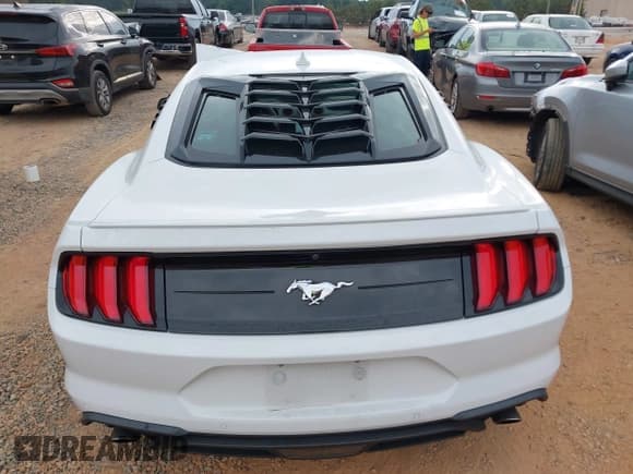 ✅ 2021 Ford Mustang EcoBoost • VIN: 1FA6P8TH9M5101140 • Lot: 43309485. Listed on IAAI with 69,861 mi. Free auction sales archive from the USA and detailed vehicle history report at DreamBid. Image 16.