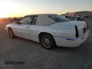 ✅ 2002 Cadillac Eldorado ESC • VIN: 1G6EL12Y72B101231 • Лот: 79971954. Опубликован ранее на Copart с пробегом 87 408 миль. Бесплатный доступ к архиву аукционных продаж из США и подробный отчёт об истории автомобиля на DreamBid. Изображение 2.
