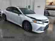 2022 Toyota Camry Hybrid XLE with VIN 4T1F31AK4NU572580, listed as a IAAI auction lot 42244158 with 69,247 mi miles and . Bid and sale history available at DreamBid. Image 1.