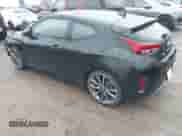 2019 Hyundai Veloster Premium z VIN KMHTG6AF0KU019038, wystawiony jako IAAI lot #41236750 z przebiegiem 83 164 mil mil oraz . Historia ofert i sprzedaży dostępna na DreamBid. Obrazek 3.