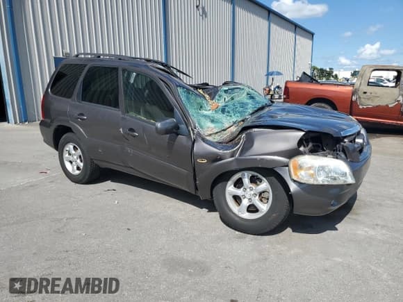 ✅ 2006 Mazda Tribute S • VIN: 4F2YZ06156KM24361 • Lot: 62201885. Listed on Copart with Not provided. Free auction sales archive from the USA and detailed vehicle history report at DreamBid. Image 4.
