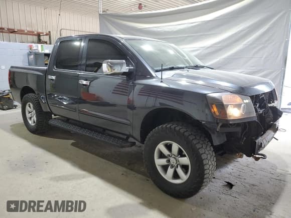 ✅ 2010 Nissan Titan SE • VIN: 1N6AA0EJ8AN318615 • Lot: 67966485. Listed on Copart with 120,411 mi. Free auction sales archive from the USA and detailed vehicle history report at DreamBid. Image 4.