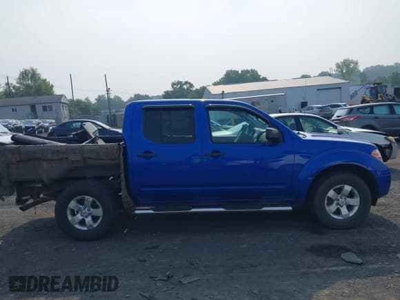 ✅ 2013 Nissan Frontier SV • VIN: 1N6AD0EV6DN741028 • Lot: 42900448. Listed on IAAI with 177,965 mi. Free auction sales archive from the USA and detailed vehicle history report at DreamBid. Image 13.