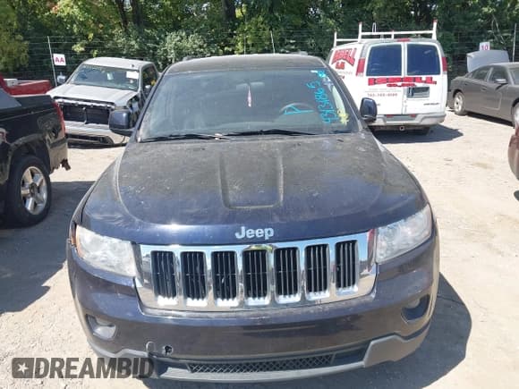 ✅ 2011 Jeep Grand Cherokee Laredo • VIN: 1J4RR4GG7BC512891 • Lot: 43131865. Listed on IAAI with 198,599 mi. Free auction sales archive from the USA and detailed vehicle history report at DreamBid. Image 6.