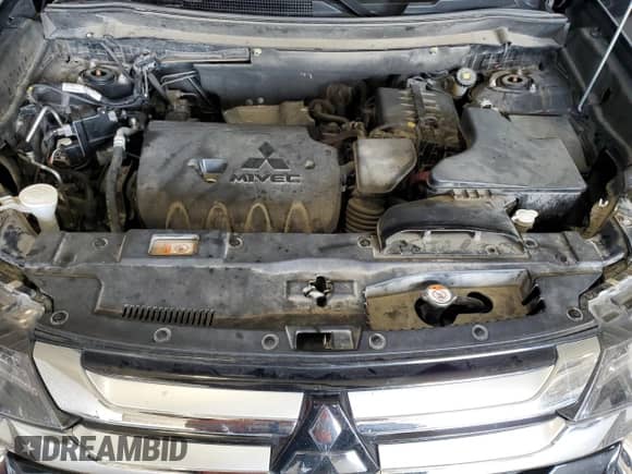 2018 Mitsubishi Outlander ES z VIN JA4AD2A35JZ023939, wystawiony jako Copart lot #71499925 z przebiegiem 159 582 mil mil oraz Szkoda całkowita • Salvage title. Historia ofert i sprzedaży dostępna na DreamBid. Obrazek 12.