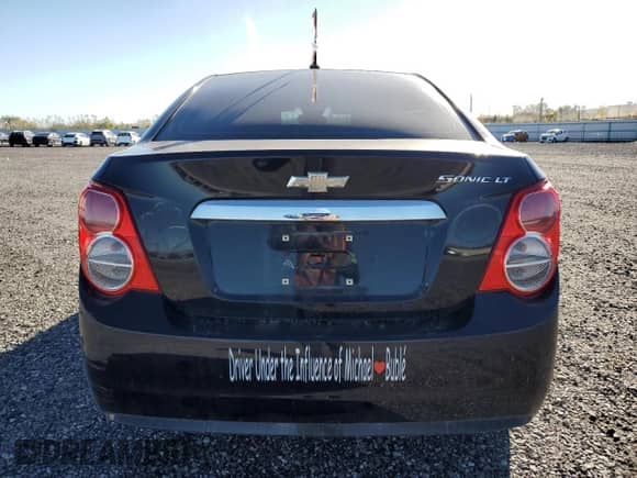 2012 Chevrolet Sonic LT с VIN 1G1JC5EHXC4204379, выставлен на аукционе Copart как лот 90040615 с пробегом 186 920 миль миль и Списание • Salvage title. История ставок и продаж доступна на DreamBid. Изображение 6.