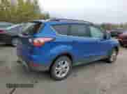 2018 Ford Escape SE z VIN 1FMCU9GD7JUA05961, wystawiony jako Copart lot #82458805 z przebiegiem Nie podano mil oraz Czysty tytuł • Clean title. Historia ofert i sprzedaży dostępna na DreamBid. Obrazek 3.