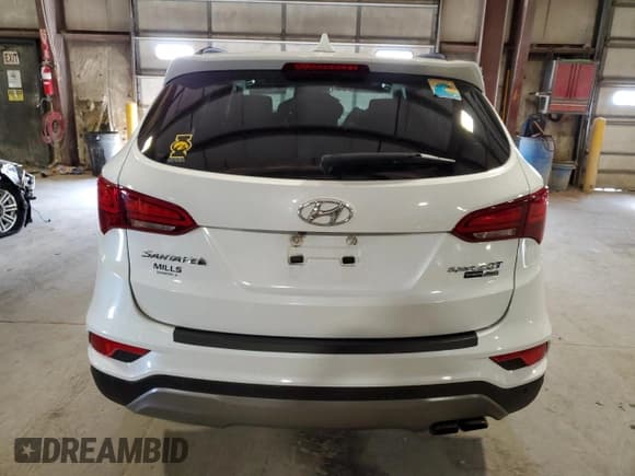 ✅ 2018 Hyundai Santa Fe Ultimate • VIN: 5NMZWDLA6JH054390 • Лот: 59157344. Опубликован ранее на Copart с пробегом 71 582 миль. Бесплатный доступ к архиву аукционных продаж из США и подробный отчёт об истории автомобиля на DreamBid. Изображение 6.