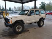 ✅ 1998 Jeep Cherokee Sport • VIN: 1J4FJ68S7WL169885 • Lot: 43792886. Listed on IAAI with 201,014 mi. Free auction sales archive from the USA and detailed vehicle history report at DreamBid. Image 2.