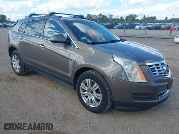 ✅ 2014 Cadillac SRX • VIN: 3GYFNAE31ES556252 • Lot: 43317021. Wystawiony na IAAI z przebiegiem 162 882 mil. Bezpłatny archiwum sprzedaży aukcyjnych z USA i szczegółowy raport historii pojazdu na DreamBid. Zdjęcie 1.