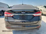 ✅ 2017 Ford Fusion Hybrid Titanium • VIN: 3FA6P0RU4HR188163 • Lot: 85920365. Wystawiony na Copart z przebiegiem 143 671 mil. Bezpłatny archiwum sprzedaży aukcyjnych z USA i szczegółowy raport historii pojazdu na DreamBid. Zdjęcie 6.