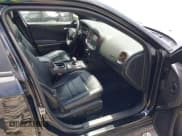 ✅ 2013 Dodge Charger SXT Plus • VIN: 2C3CDXJG1DH584579 • Lot: 42128401. Listed on IAAI with 100,388 mi. Free auction sales archive from the USA and detailed vehicle history report at DreamBid. Image 5.