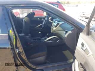 2017 Hyundai Veloster z VIN KMHTC6AD9HU324489, wystawiony jako IAAI lot #43441158 z przebiegiem 103 056 mil mil oraz . Historia ofert i sprzedaży dostępna na DreamBid. Obrazek 5.