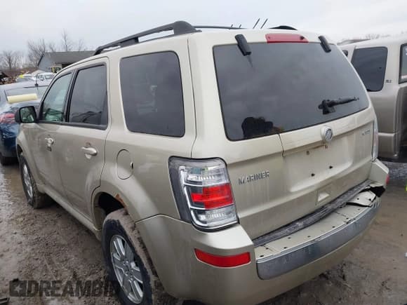 ✅ 2011 Mercury Mariner • VIN: 4M2CN8B76BKJ06851 • Lot: 41652014. Listed on IAAI with 118,914 mi. Free auction sales archive from the USA and detailed vehicle history report at DreamBid. Image 3.