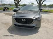 ✅ 2022 Mazda CX-5 2.5 Turbo • VIN: JM3KFBAY6N0607767 • Лот: 71276325. Опубликован ранее на Copart с пробегом 63 133 миль. Бесплатный доступ к архиву аукционных продаж из США и подробный отчёт об истории автомобиля на DreamBid. Изображение 14.