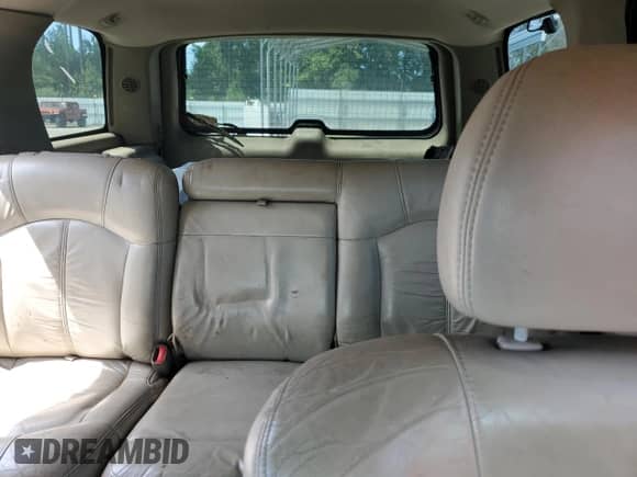 2001 Chevrolet Tahoe LT z VIN 1GNEC13T21J149182, wystawiony jako Copart lot #70359615 z przebiegiem Nie podano mil oraz Nie do naprawy • Non repairable. Historia ofert i sprzedaży dostępna na DreamBid. Obrazek 10.