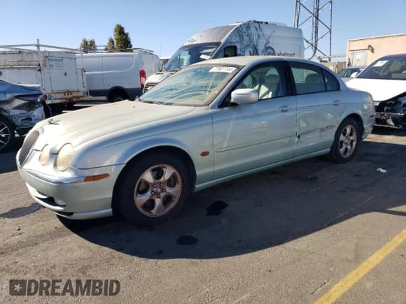 ✅ 2000 Jaguar S-Type V6 • VIN: SAJDA01C1YFL08702 • Лот: 77827744. Опубликован ранее на Copart с пробегом 116 862 миль. Бесплатный доступ к архиву аукционных продаж из США и подробный отчёт об истории автомобиля на DreamBid. Изображение 1.