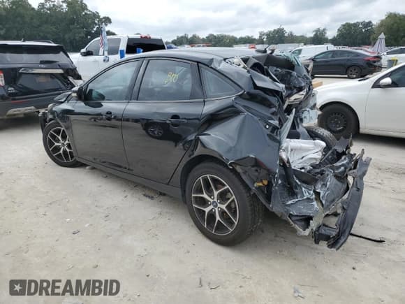 ✅ 2017 Ford Focus SEL • VIN: 1FADP3H28HL317495 • Lot: 90641415. Wystawiony na Copart z przebiegiem 127 493 mil. Bezpłatny archiwum sprzedaży aukcyjnych z USA i szczegółowy raport historii pojazdu na DreamBid. Zdjęcie 2.