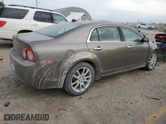 ✅ 2012 Chevrolet Malibu LTZ • VIN: 1G1ZE5EU7CF157570 • Lot: 82427004. Listed on Copart with 152,932 mi. Free auction sales archive from the USA and detailed vehicle history report at DreamBid. Image 3.
