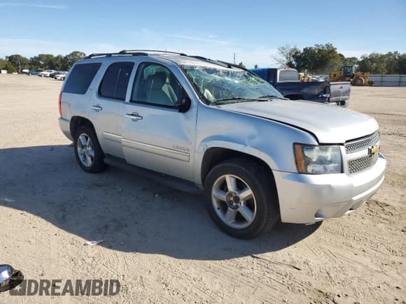 ✅ 2014 Chevrolet Tahoe LTZ • VIN: 1GNSKCE00ER138483 • Lot: 89816695. Listed on Copart with 119,080 mi. Free auction sales archive from the USA and detailed vehicle history report at DreamBid. Image 4.