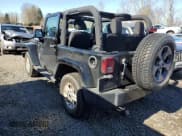 ✅ 2018 Jeep Wrangler Sahara • VIN: 1C4AJWBG7JL870391 • Lot: 46806045. Listed on Copart with 56,897 mi. Free auction sales archive from the USA and detailed vehicle history report at DreamBid. Image 2.