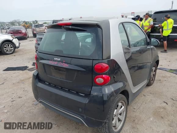 ✅ 2013 Smart fortwo Pure • VIN: WMEEJ3BA5DK620493 • Лот: 42071086. Опубликован ранее на IAAI с пробегом 85 883 миль. Бесплатный доступ к архиву аукционных продаж из США и подробный отчёт об истории автомобиля на DreamBid. Изображение 4.