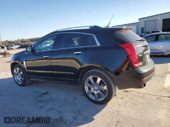 ✅ 2012 Cadillac SRX Performance Collection • VIN: 3GYFNBE33CS646165 • Lot: 90860355. Wystawiony na Copart z przebiegiem 157 539 mil. Bezpłatny archiwum sprzedaży aukcyjnych z USA i szczegółowy raport historii pojazdu na DreamBid. Zdjęcie 2.