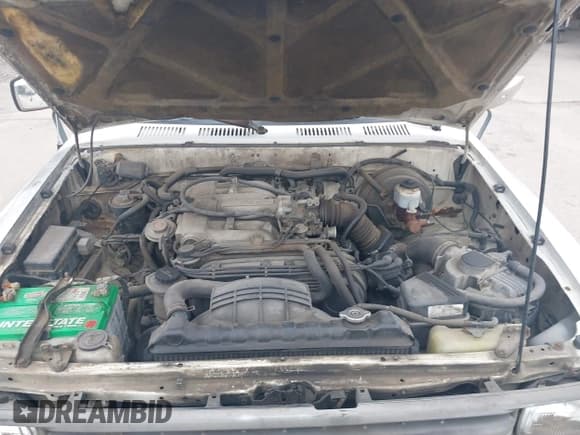 ✅ 1989 Toyota Pickup • VIN: JT4VN82N4K5001298 • Lot: 41933380. Wystawiony na IAAI z przebiegiem 181 557 mil. Bezpłatny archiwum sprzedaży aukcyjnych z USA i szczegółowy raport historii pojazdu na DreamBid. Zdjęcie 10.