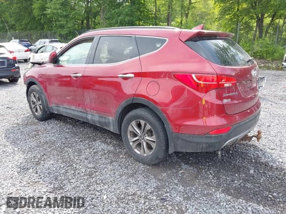 ✅ 2015 Hyundai Santa Fe • VIN: 5XYZUDLB4FG294425 • Lot: 42642628. Listed on IAAI with 89,000 mi. Free auction sales archive from the USA and detailed vehicle history report at DreamBid. Image 3.