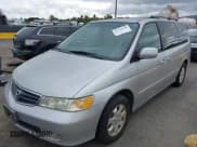 ✅ 2003 Honda Odyssey EX-L • VIN: 5FNRL18773B062409 • Лот: 43748238. Опубликован ранее на IAAI с пробегом 163 959 миль. Бесплатный доступ к архиву аукционных продаж из США и подробный отчёт об истории автомобиля на DreamBid. Изображение 6.