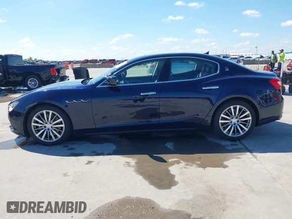 ✅ 2015 Maserati Ghibli S Q4 • VIN: ZAM57RTA3F1149382 • Lot: 42182510. Listed on IAAI with 33,671 mi. Free auction sales archive from the USA and detailed vehicle history report at DreamBid. Image 14.