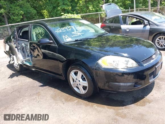 2013 Chevrolet Impala Police with VIN 2G1WD5E33D1248485, listed as a IAAI auction lot 42393973 with 101,900 mi miles and . Bid and sale history available at DreamBid. Image 1.