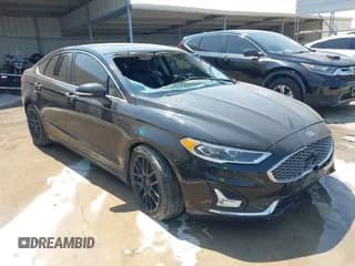 ✅ 2020 Ford Fusion Titanium • VIN: 3FA6P0D98LR204621 • Lot: 43158792. Listed on IAAI with 76,160 mi. Free auction sales archive from the USA and detailed vehicle history report at DreamBid. Image 1.