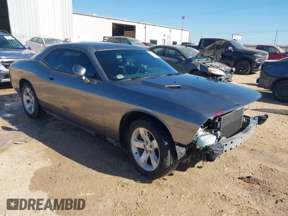 ✅ 2012 Dodge Challenger SXT • VIN: 2C3CDYAGXCH285791 • Lot: 41613090. Wystawiony na IAAI z przebiegiem 182 466 mil. Bezpłatny archiwum sprzedaży aukcyjnych z USA i szczegółowy raport historii pojazdu na DreamBid. Zdjęcie 1.