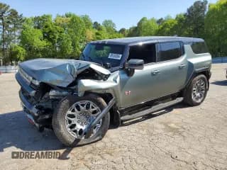 ✅ 2024 GMC Hummer EV 3X • VIN: 1GKB0RDC1RU103519 • Lot: 64767695. Wystawiony na Copart z przebiegiem Nie podano. Bezpłatny archiwum sprzedaży aukcyjnych z USA i szczegółowy raport historii pojazdu na DreamBid. Zdjęcie 1.