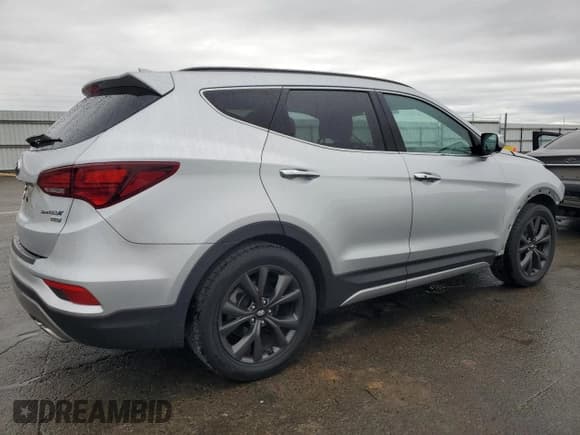 ✅ 2018 Hyundai Santa Fe Ultimate • VIN: 5XYZW4LA2JG507009 • Лот: 38081144. Опубликован ранее на Copart с пробегом 54 255 миль. Бесплатный доступ к архиву аукционных продаж из США и подробный отчёт об истории автомобиля на DreamBid. Изображение 3.