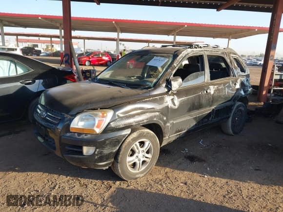 ✅ 2005 Kia Sportage LX • VIN: KNDJF723X57116260 • Lot: 40574315. Listed on IAAI with 235,396 mi. Free auction sales archive from the USA and detailed vehicle history report at DreamBid. Image 2.