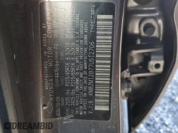 2007 Hyundai Tucson GLS z VIN KM8JM12B77U512706, wystawiony jako Copart lot #84554694 z przebiegiem 212 819 mil mil oraz Czysty tytuł • Clean title. Historia ofert i sprzedaży dostępna na DreamBid. Obrazek 13.