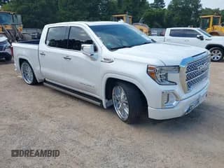 ✅ 2021 GMC Sierra 1500 Denali • VIN: 3GTU9FEL4MG123072 • Lot: 43257227. Listed on IAAI with 136,838 mi. Free auction sales archive from the USA and detailed vehicle history report at DreamBid. Image 1.
