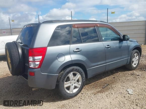 ✅ 2006 Suzuki Grand Vitara Luxury • VIN: JS3TE947864101994 • Lot: 42755764. Listed on IAAI with 110,890 mi. Free auction sales archive from the USA and detailed vehicle history report at DreamBid. Image 4.