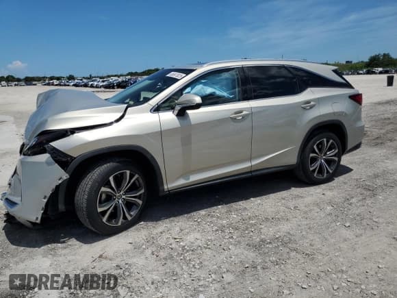 ✅ 2020 Lexus RX 350L • VIN: JTJHZKEA1L2017739 • Lot: 65697825. Listed on Copart with 33,413 mi. Free auction sales archive from the USA and detailed vehicle history report at DreamBid. Image 1.