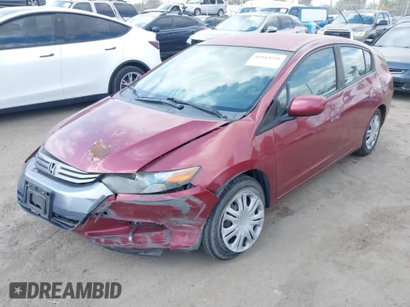 ✅ 2010 Honda Insight LX • VIN: JHMZE2H56AS030595 • Lot: 43443169. Listed on IAAI with 123,456 mi. Free auction sales archive from the USA and detailed vehicle history report at DreamBid. Image 17.