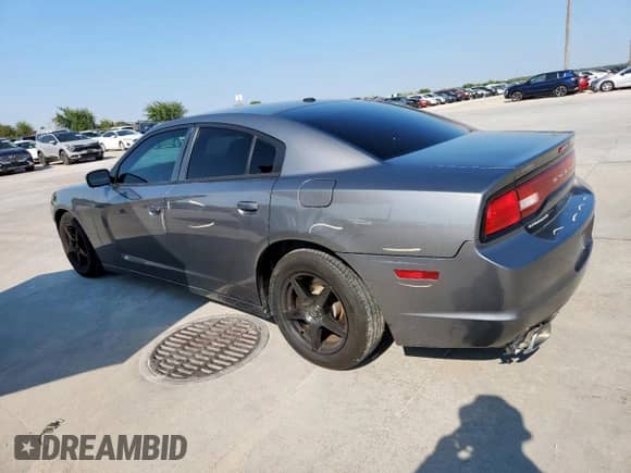 2012 Dodge Charger SE с VIN 2C3CDXBG3CH171706, выставлен на аукционе Copart как лот 71076475 с пробегом 159 142 миль миль и Списание • Salvage title. История ставок и продаж доступна на DreamBid. Изображение 2.
