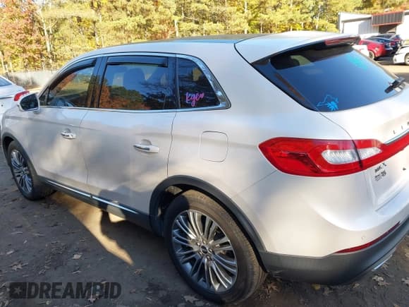 ✅ 2016 Lincoln MKX Reserve • VIN: 2LMTJ6LR2GBL51623 • Lot: 43660971. Listed on IAAI with 134,973 mi. Free auction sales archive from the USA and detailed vehicle history report at DreamBid. Image 14.