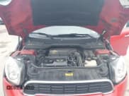 ✅ 2014 MINI Countryman S • VIN: WMWZC5C50EWP39566 • Lot: 42456424. Listed on IAAI with 99,518 mi. Free auction sales archive from the USA and detailed vehicle history report at DreamBid. Image 10.